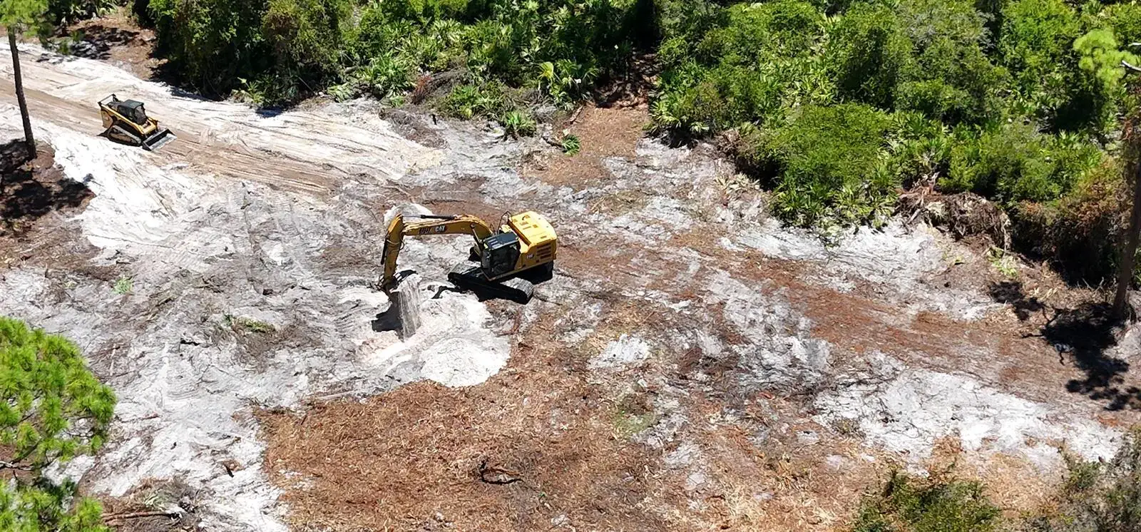 Driveway cut, fill and final grade — Hector Tractor excavator, Lehigh Acres, FL