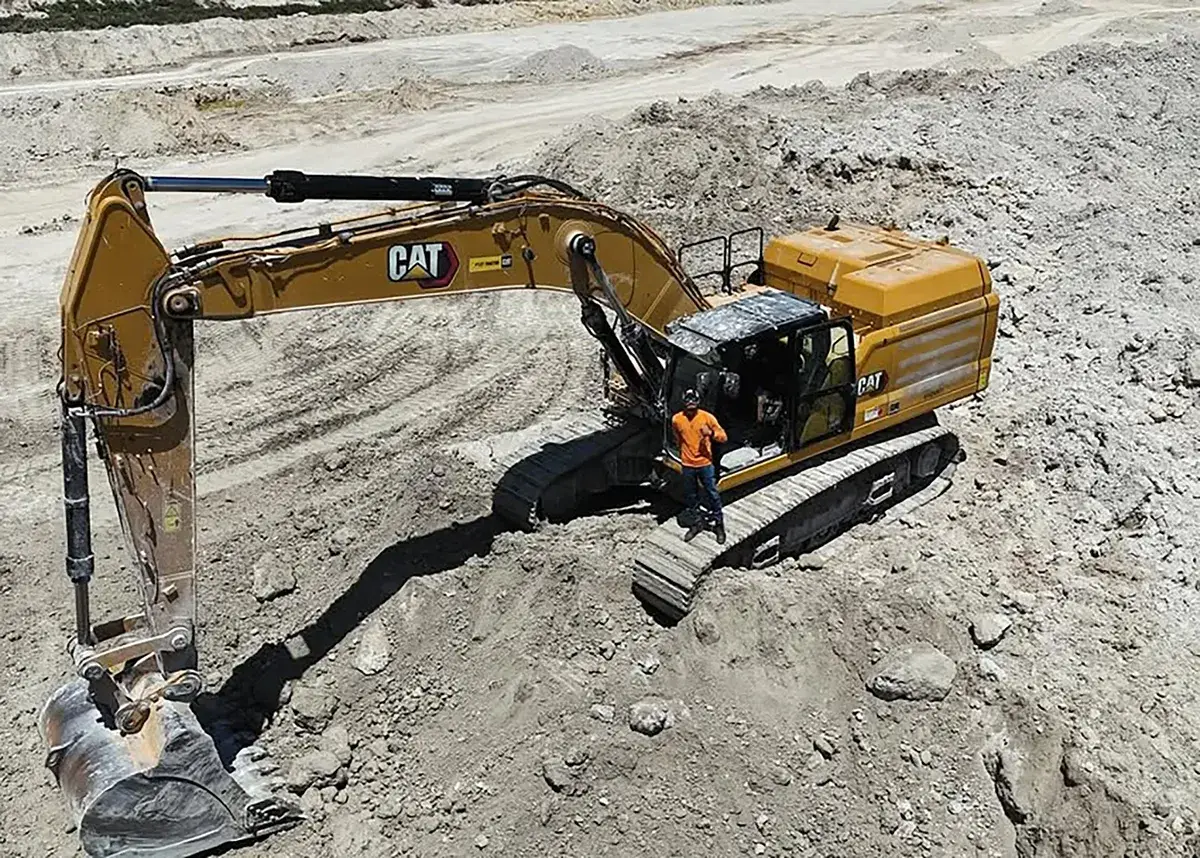 Hector Tractor excavator and operator on an excavation site in Naples, FL