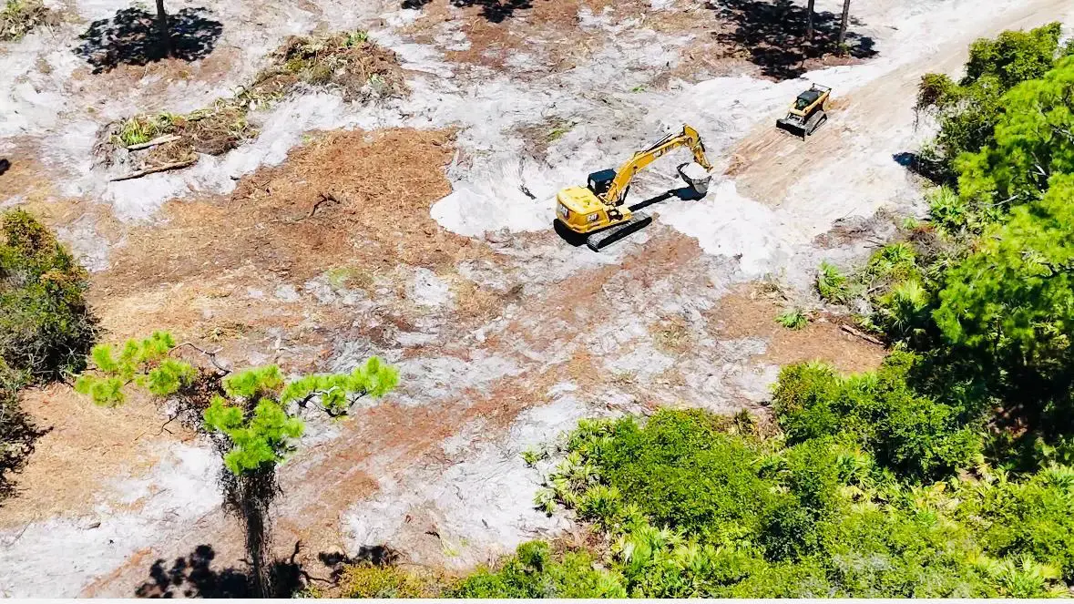 Aerial view of brush removal and rough grading in Immokalee, Florida